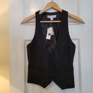 Black vest and suit jacket blazer